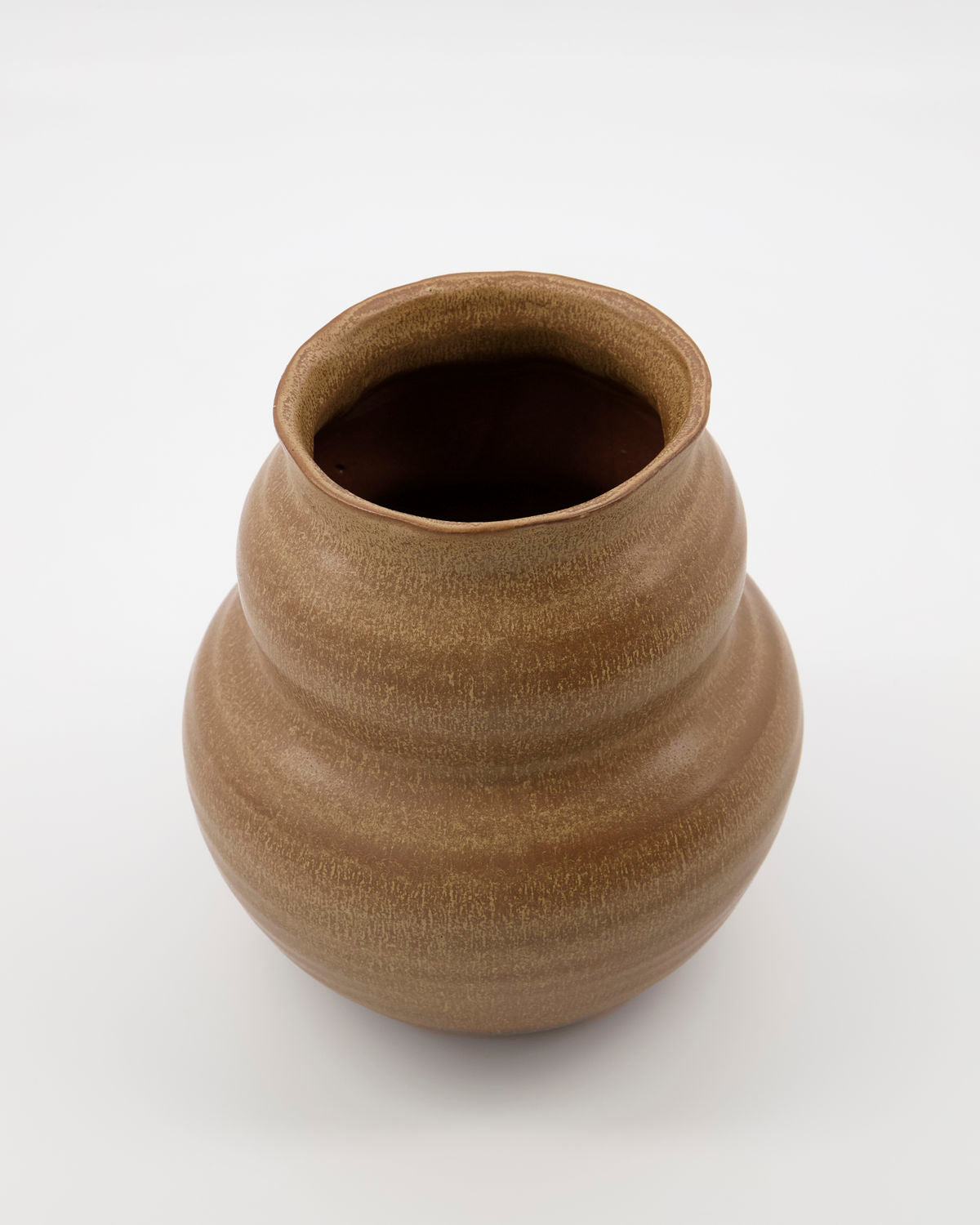 up close of rustic brown vase