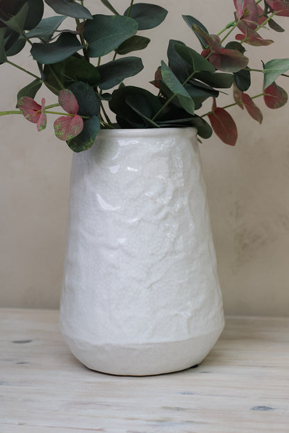 up close of white rustic vase