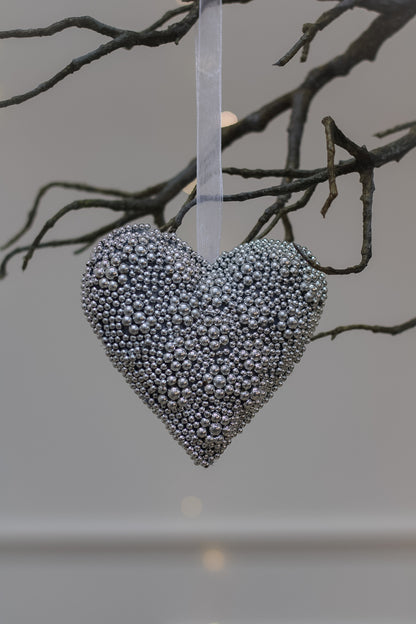 hanging heart on rustic branch