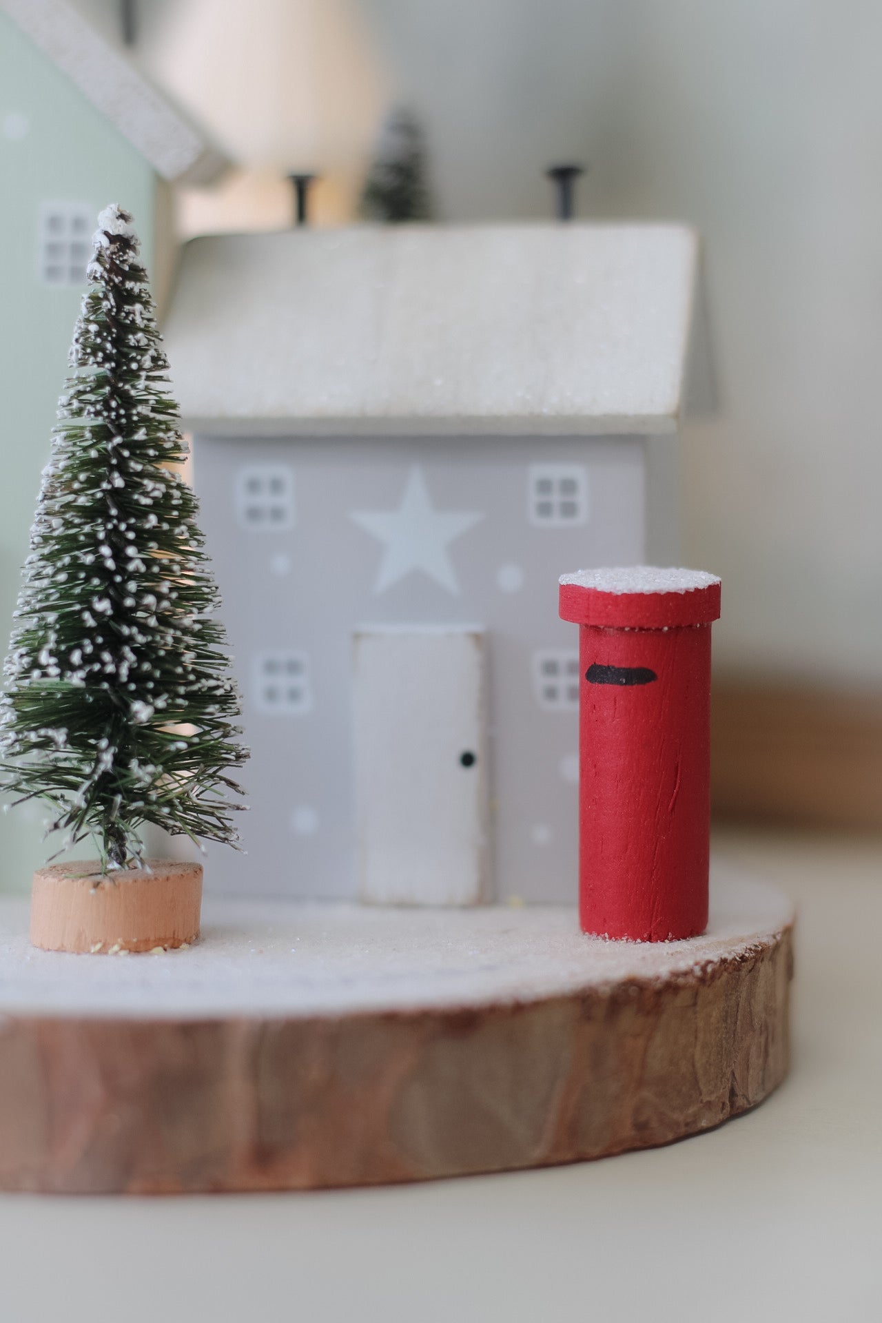 Merry Christmas Houses on Wooden Log Slice