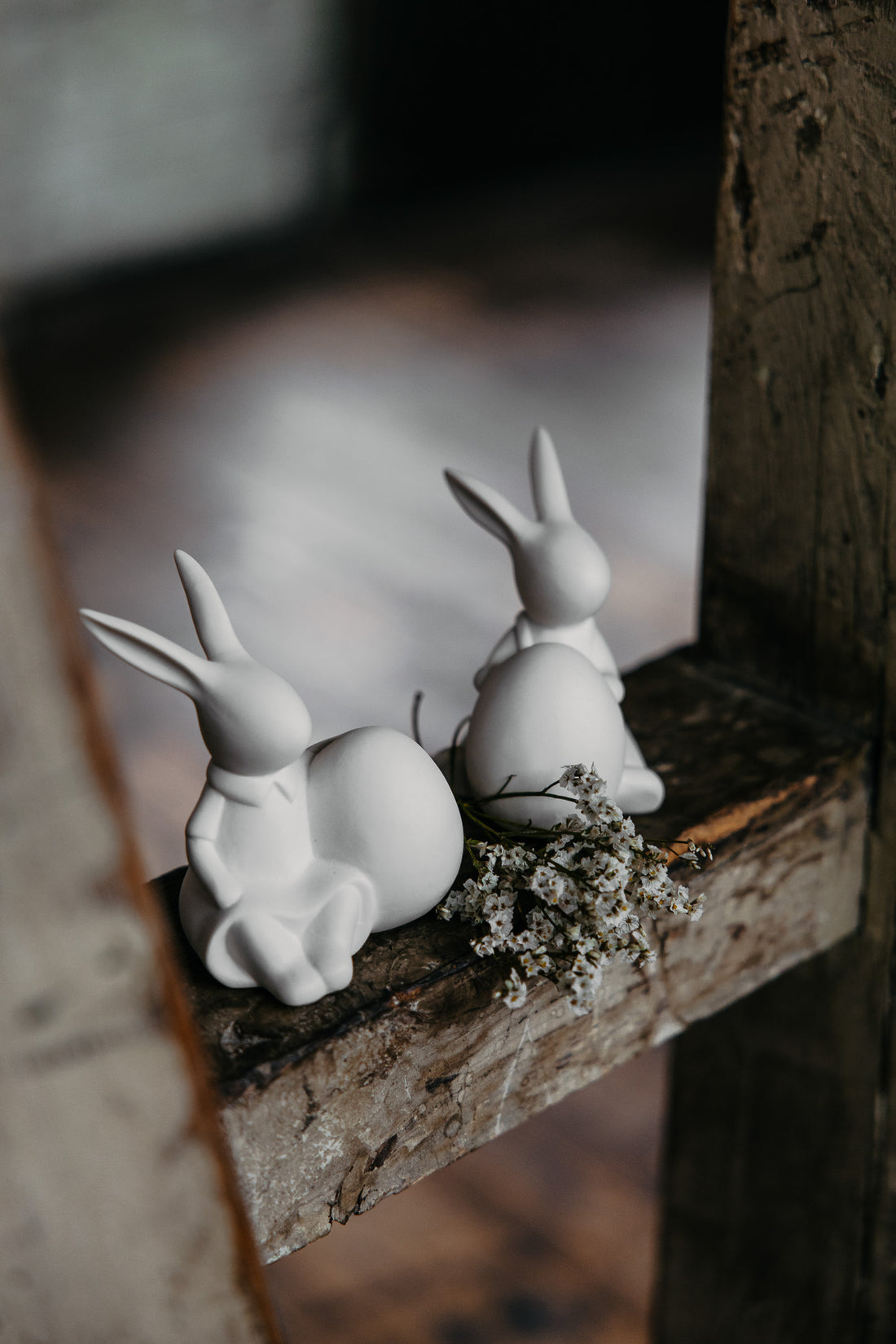 matt white sitting porcelain bunnies with flowers