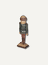 A small handcrafted wooden nutcracker figurine with an acorn hat, dark green jacket, brown pants, and a square wooden base, shown against a plain off-white background.