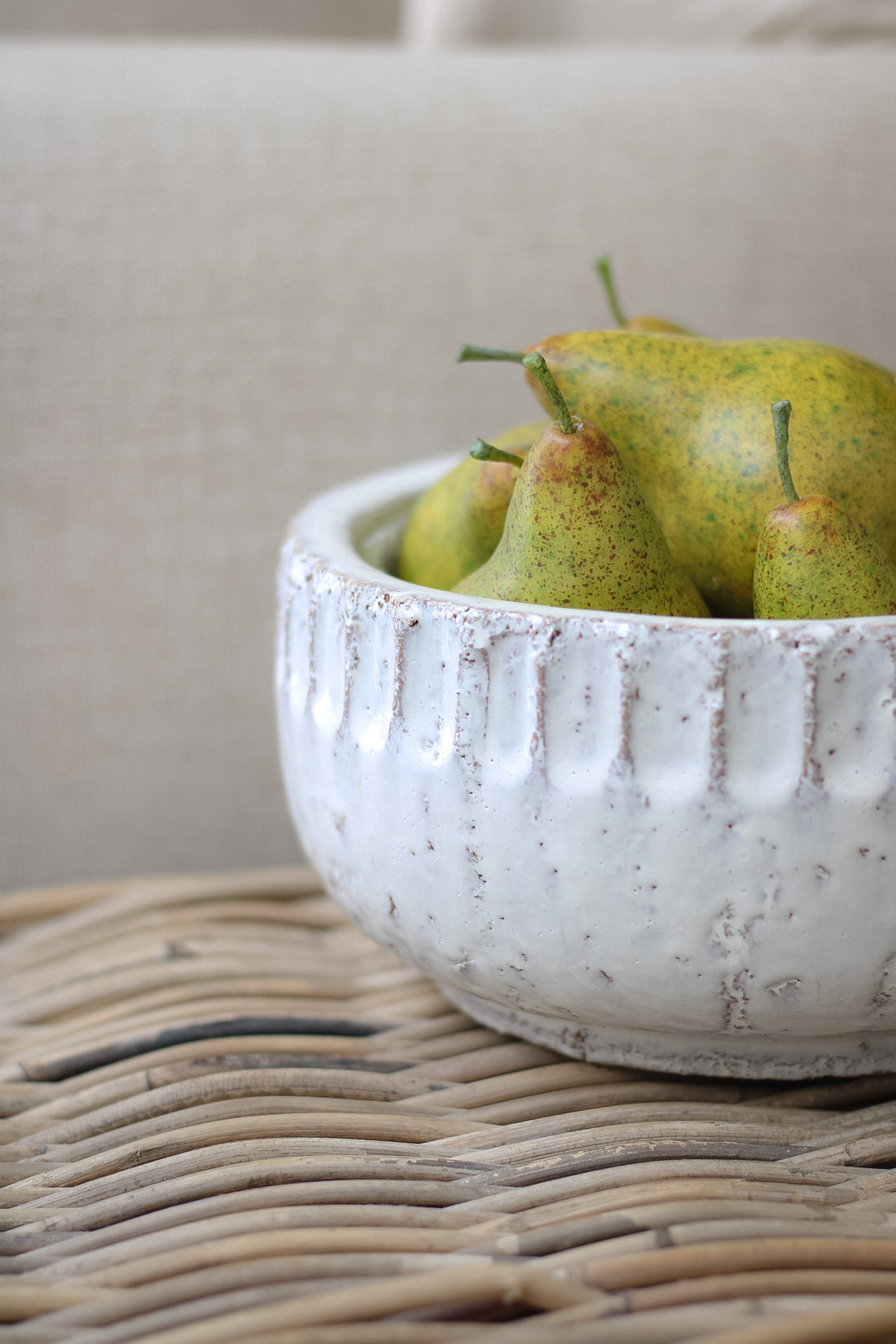 up close of distressed cream bowl