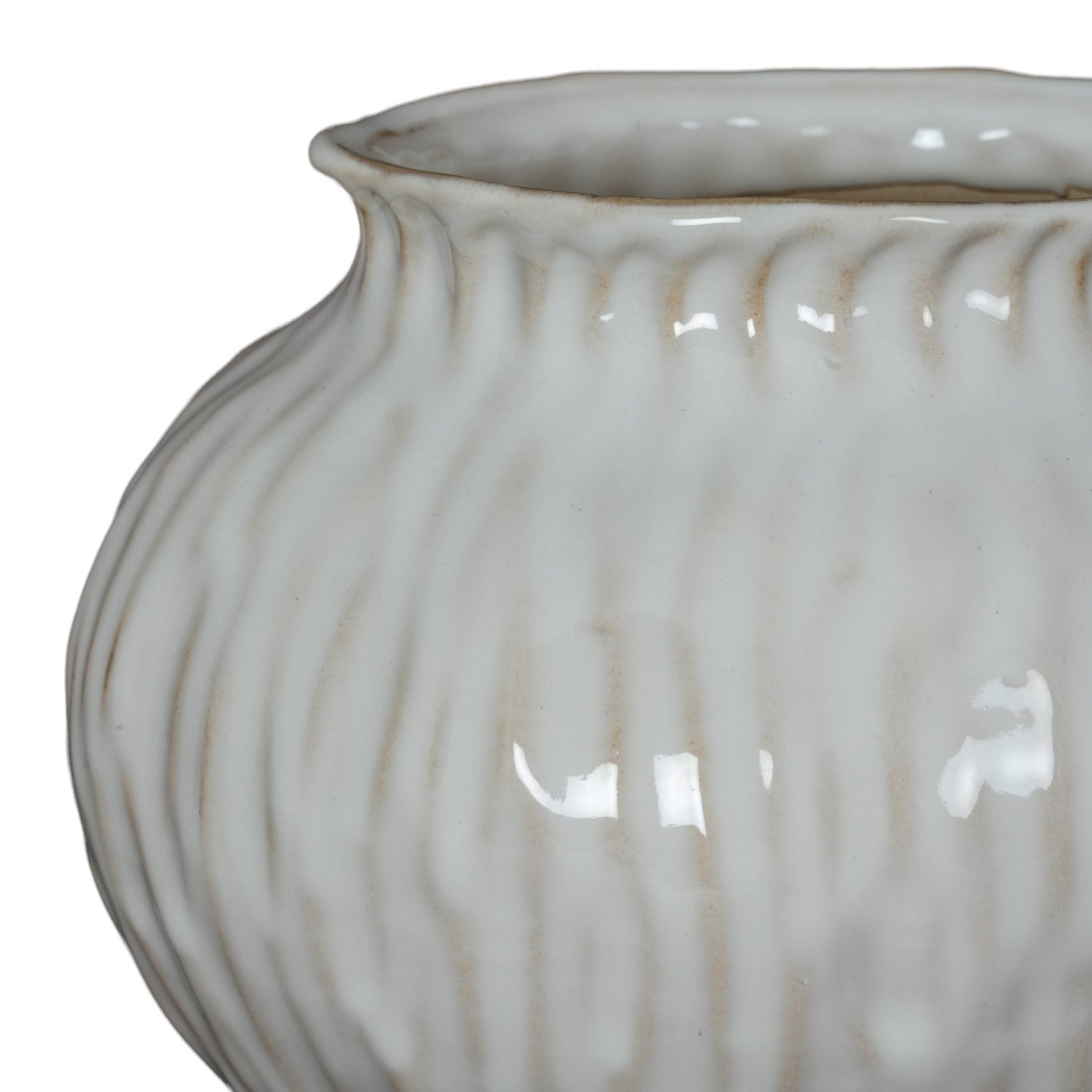 Close-up of a textured ceramic vase on a white background
