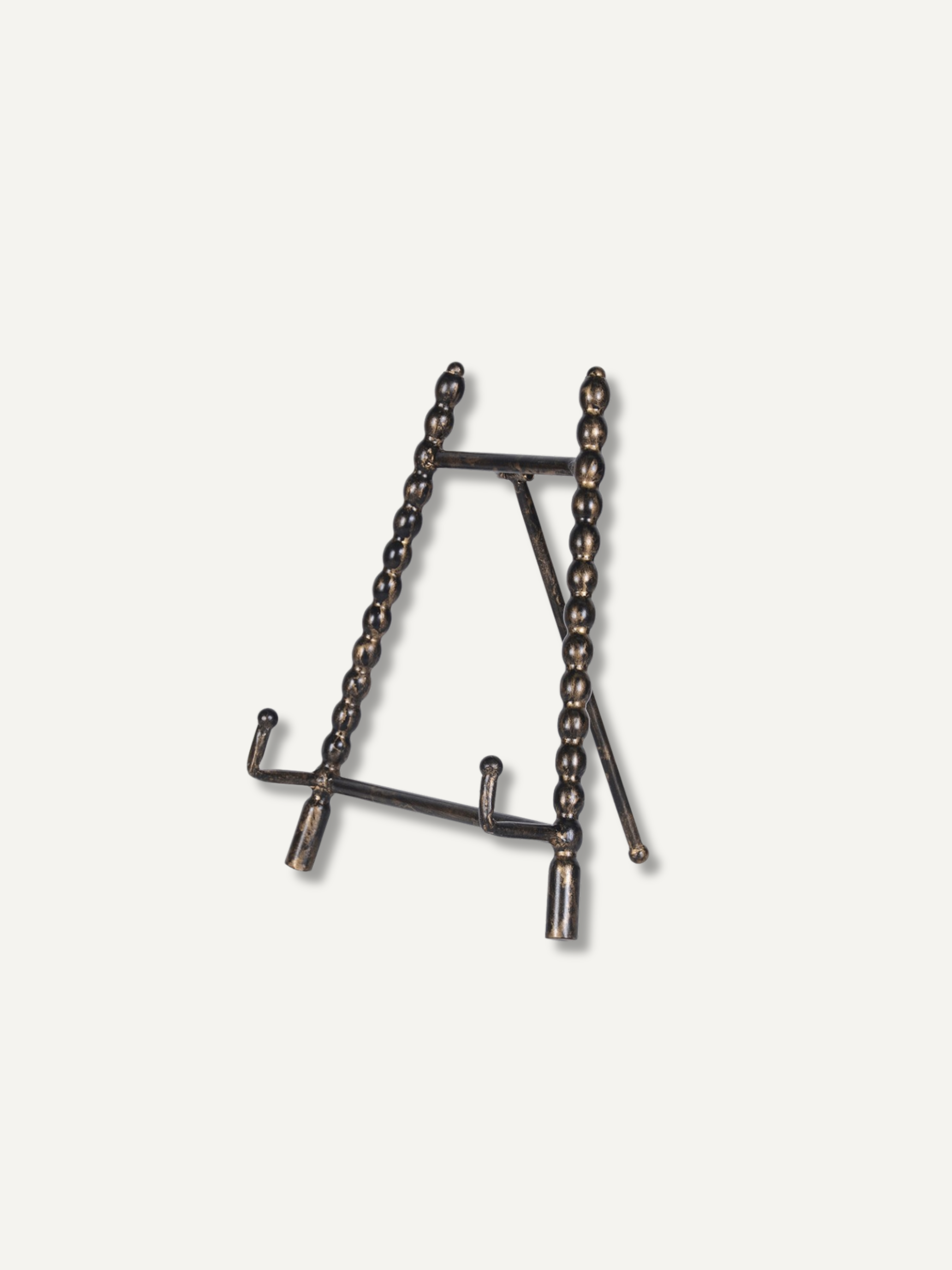 A dark bronze  beaded mini easel with a beaded chain design, shown on a plain off-white background.