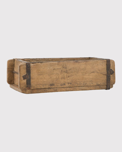 Wooden brick mould box on a white background