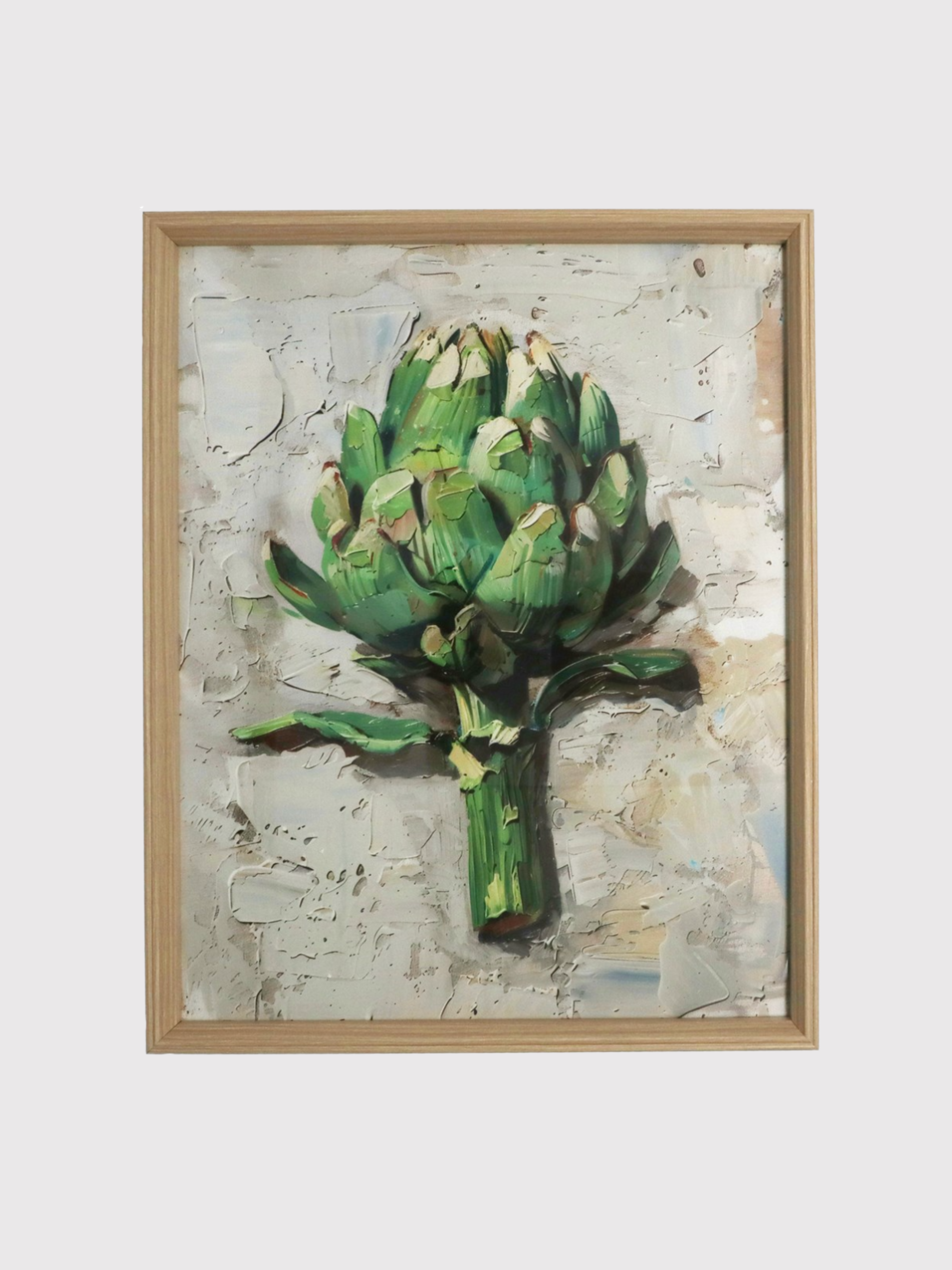 Framed artwork of a green artichoke on a textured background