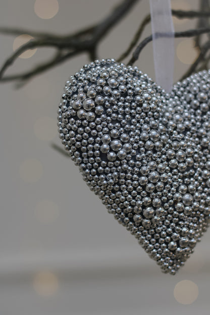 silver beaded details on heart