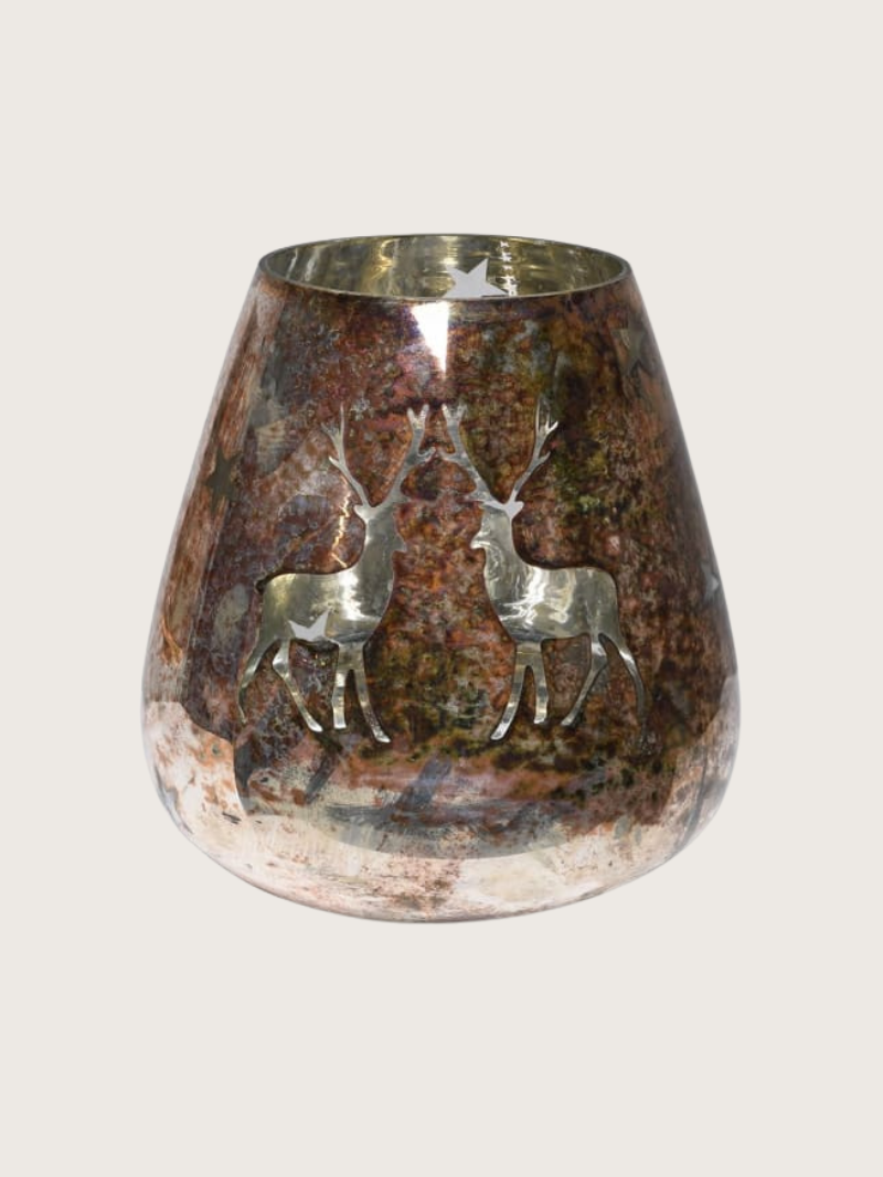 Decorative hurricane lantern with deer embossing on a light gray background