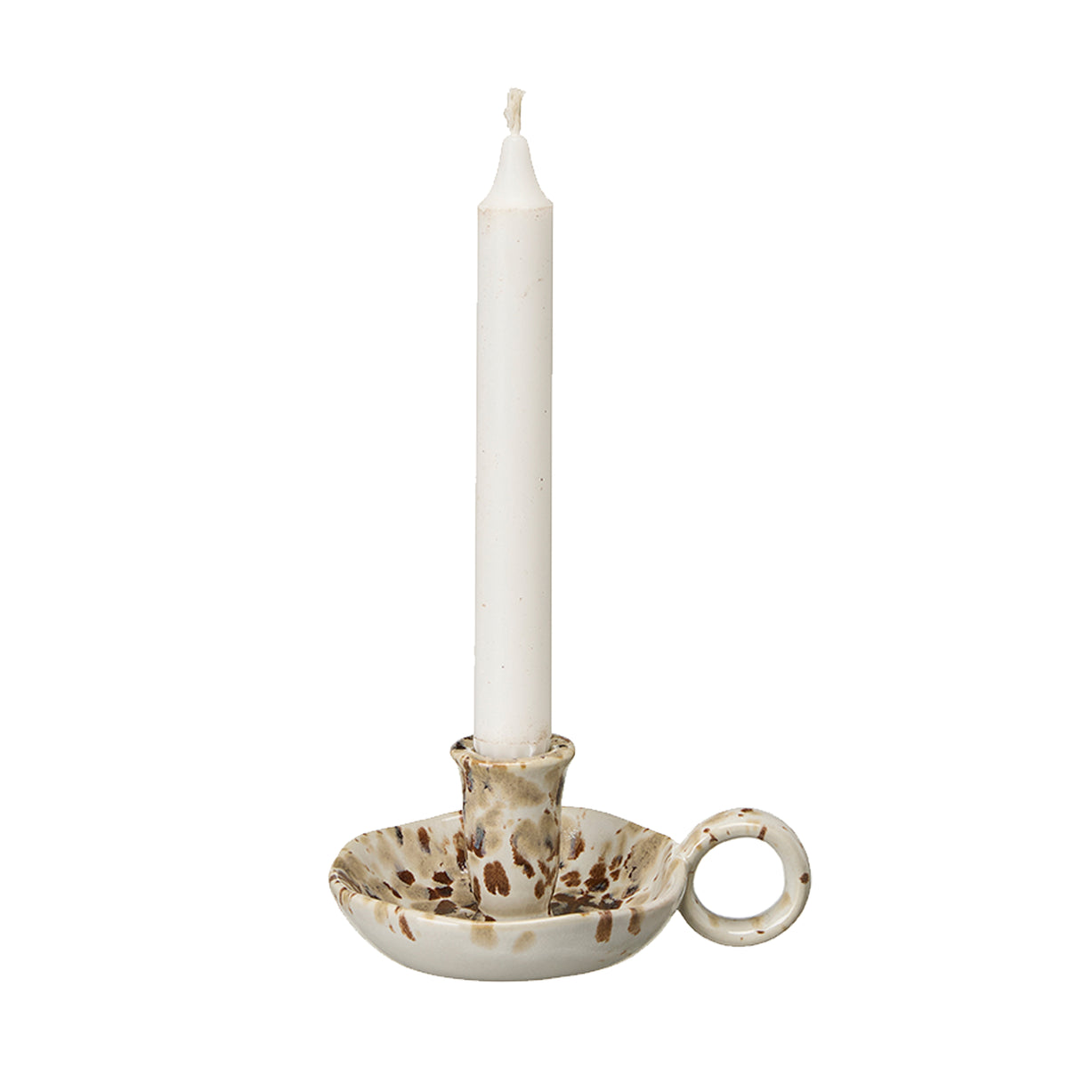 A white taper candle in a handmade ceramic candlestick holder with a brown speckled glaze and a side loop, shown on a plain white background.