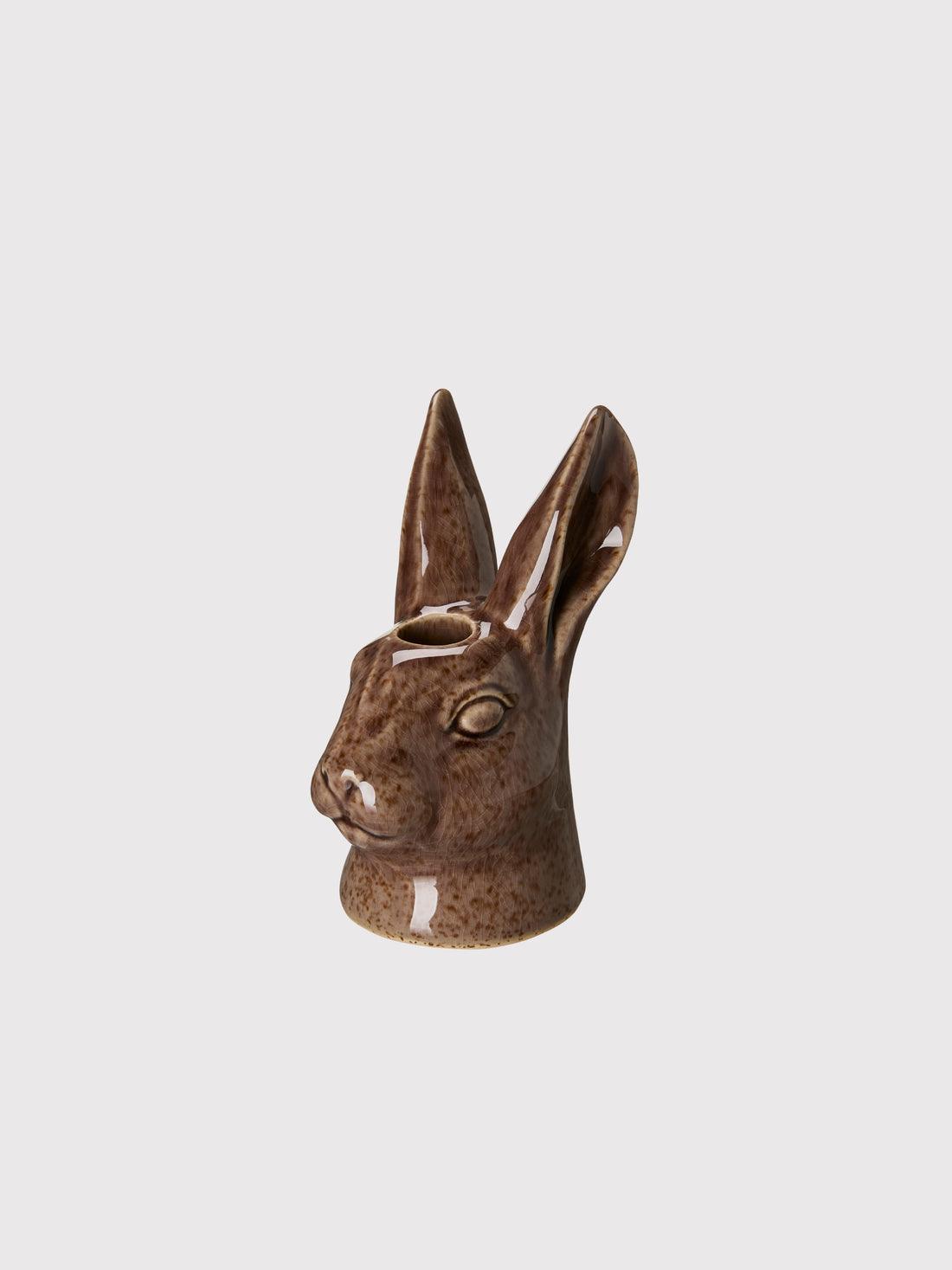 Ceramic rabbit-shaped vase on a light gray background
