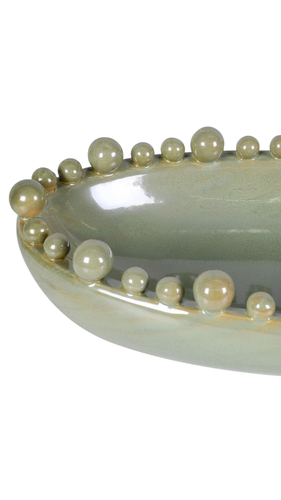 Decorative bowl with pearl-like bobbles on a white background