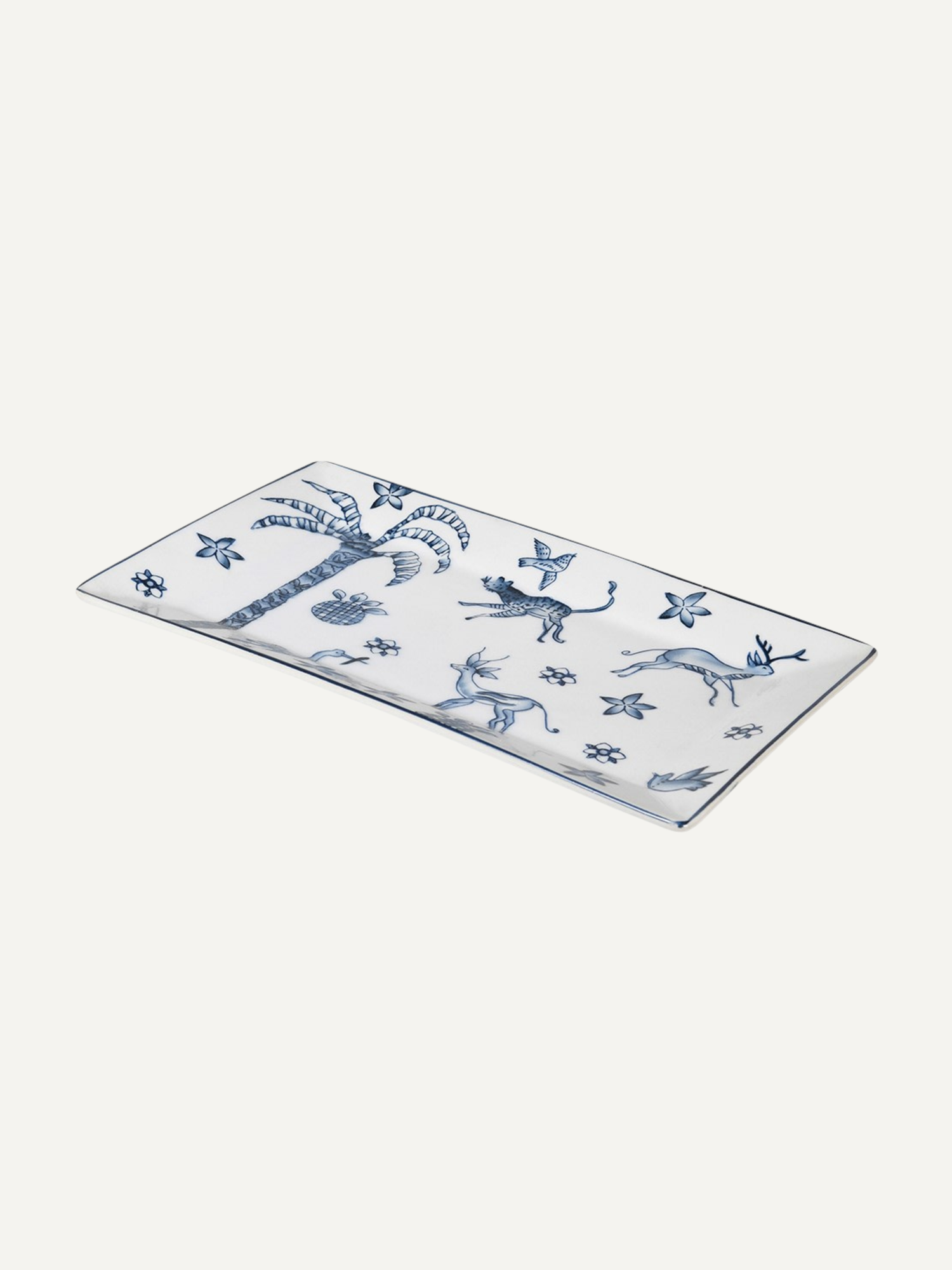 Rectangular ceramic tray with blue floral and animal pattern on a white background