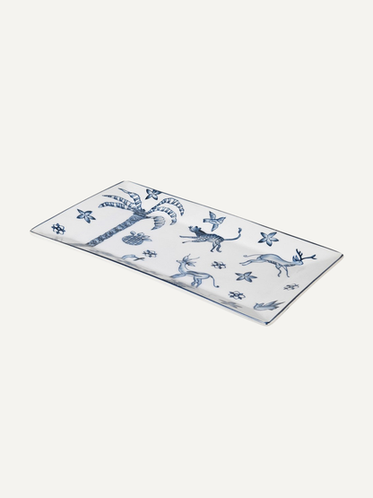 Rectangular ceramic tray with blue floral and animal pattern on a white background