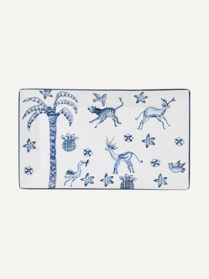 Rectangular white trinket tray with blue animal and plant patterns on a white background