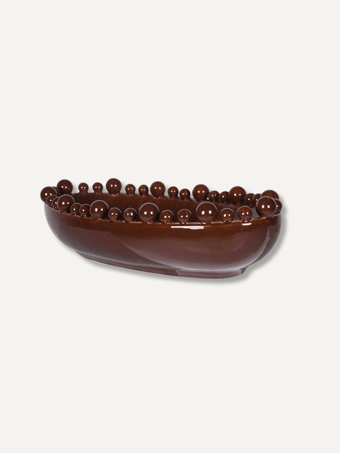 A glossy dark brown ceramic bowl with a raised rim of small spherical beads, shown on a plain light gray background.