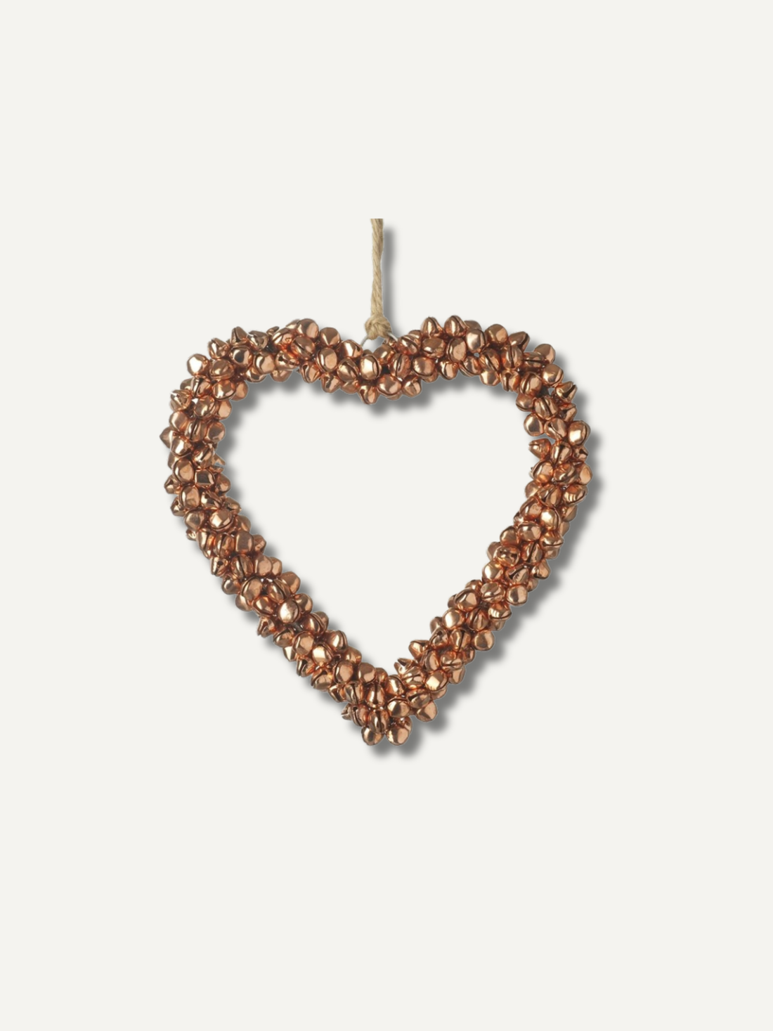 A heart-shaped hanging ornament made of small metallic copper or bronze beads with a natural twine loop at the top, shown against a plain off-white background.