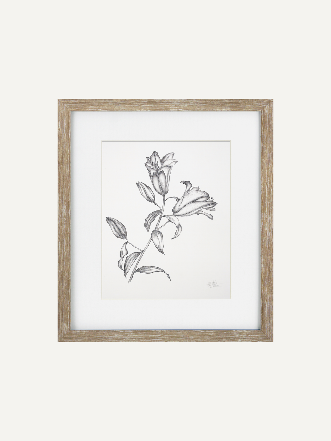 Framed botanical art print featuring a detailed pencil sketch of lily of the valley flowers, set in a white mat and a rustic light brown wooden frame against a solid off-white background.