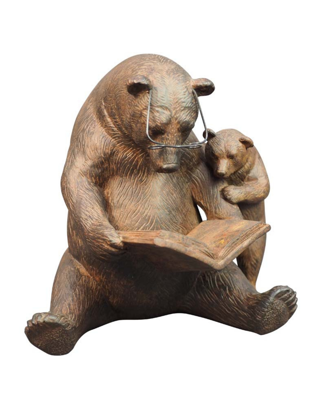 Statue of a bear reading a book to a cub on a white background