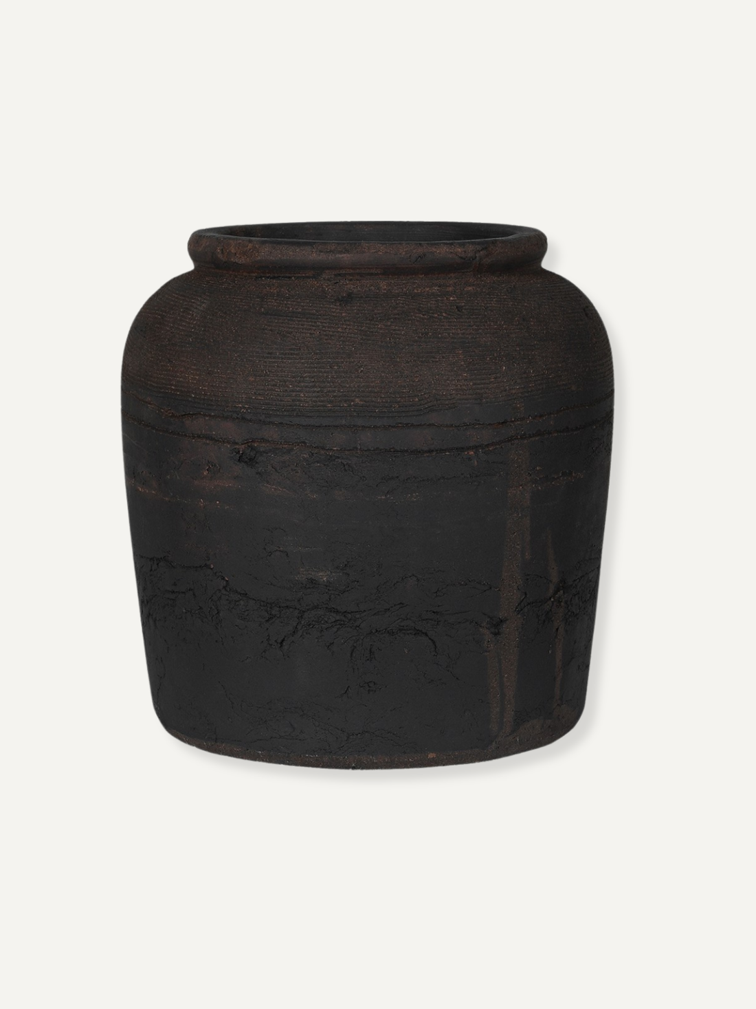 Black textured vase on a white background