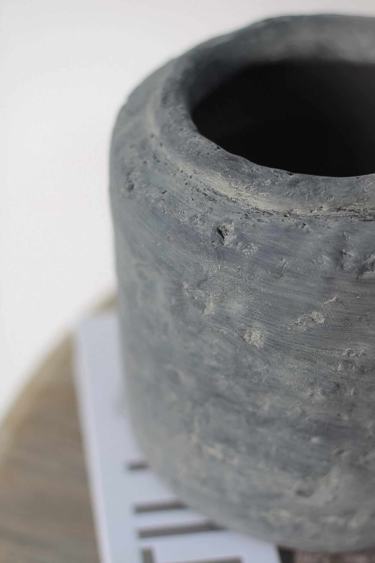 up close of rustic cement vase