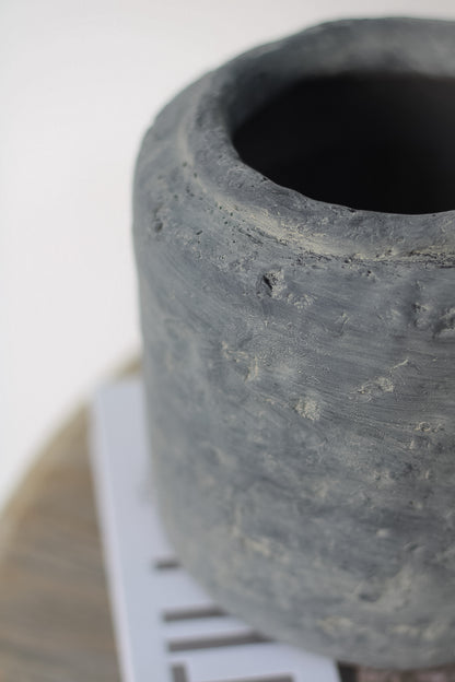 up close of rustic cement vase