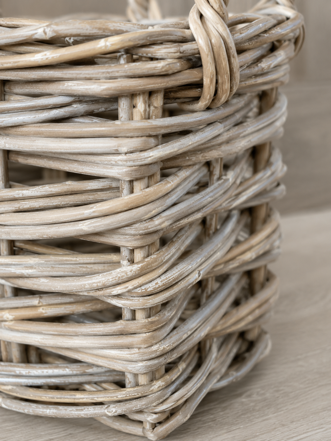 Close-up of a woven basket on a wooden surface