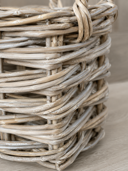 Close-up of a woven basket on a wooden surface