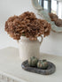 Faux Cappuccino Dried Ruffle Hydrangea in rustic white dual handled vase with autumn inspired pumpkins on green marble keepall tray