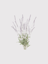 Artificial lavender plant on a light gray background