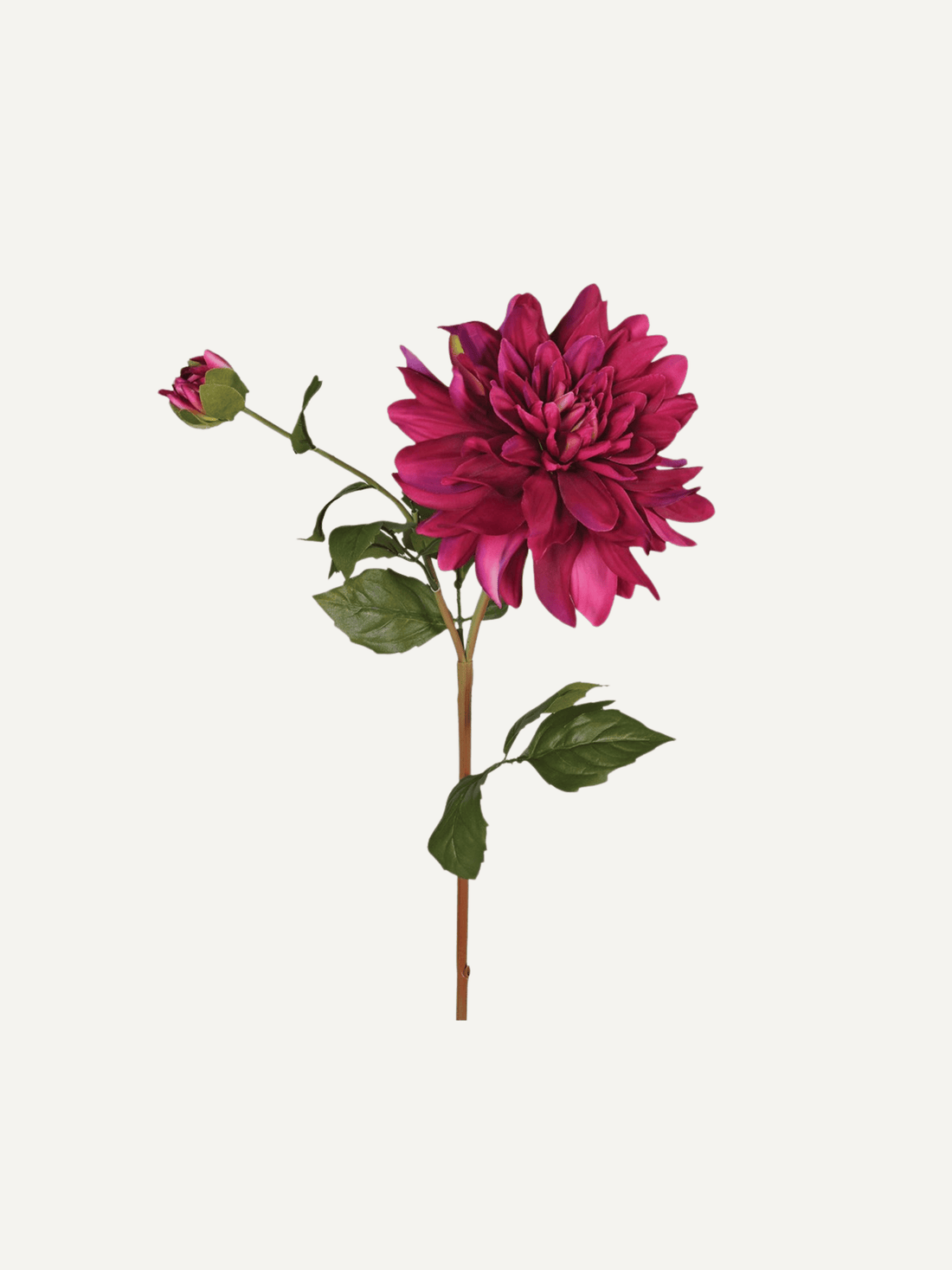 Artificial pink dahlia flower with green leaves on a white background perfect for home decor and styling