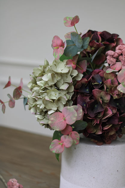 faux autumn hydrangea and blush eucalyptus floral arrangement