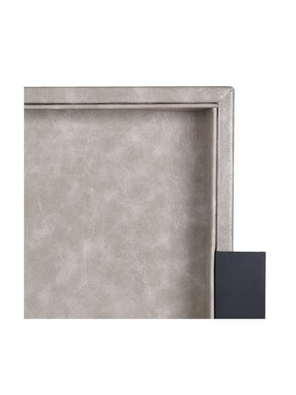 taupe tray with a textured surface on a white background