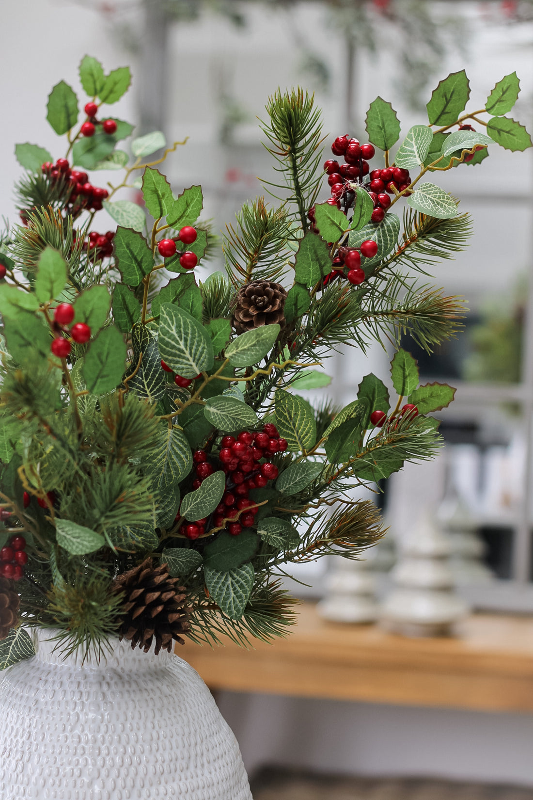 up close of pine and holly spray