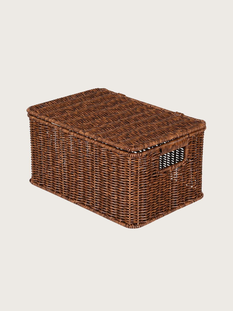Wicker storage basket with a lid on a beige background