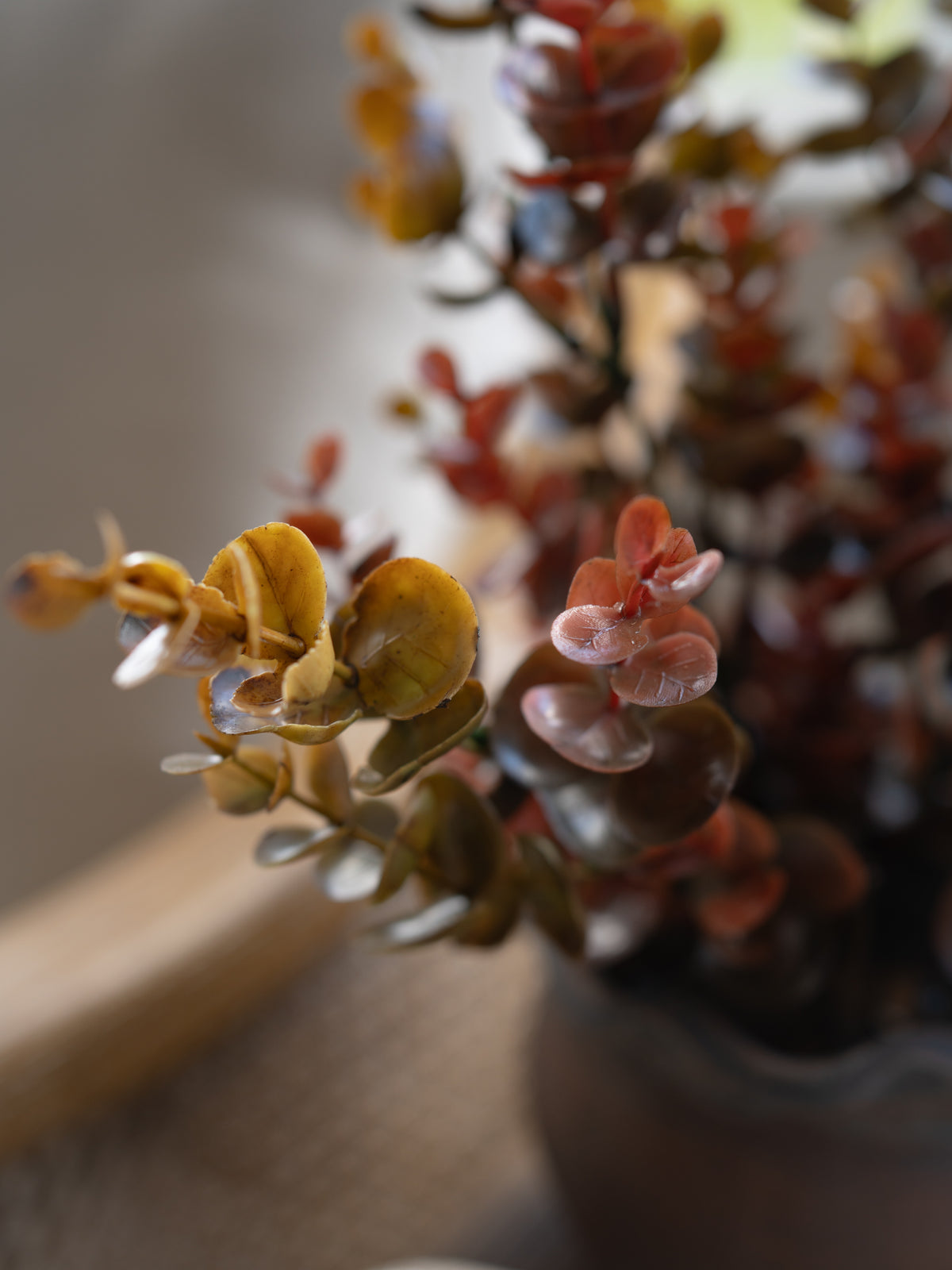Up close of Faux Rustic Autumn Eucalyptus Plant