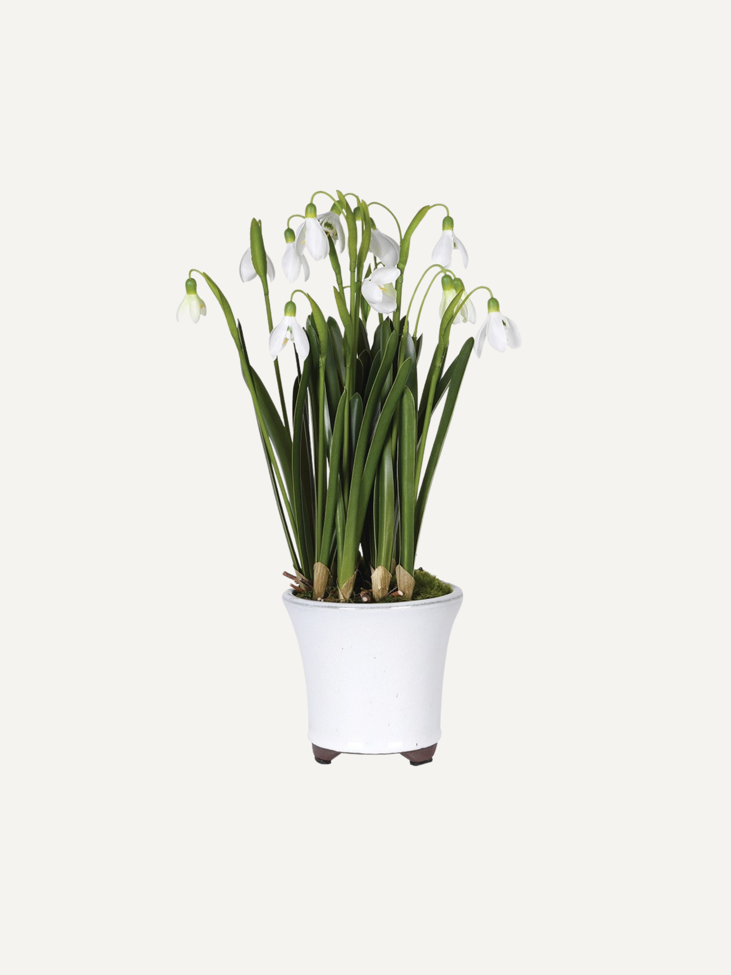 Faux potted snowdrop plant with white flowers on a light gray background, easy home styling and decor