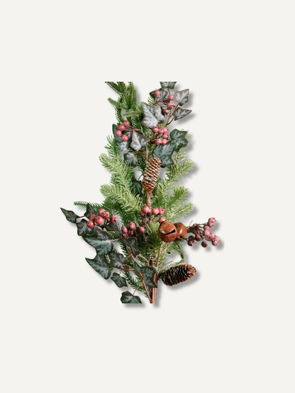 A decorative artificial christmas greenery arrangement featuring pine branches, ivy leaves, pink berries, pinecones, and a small acorn, isolated on a light gray background.