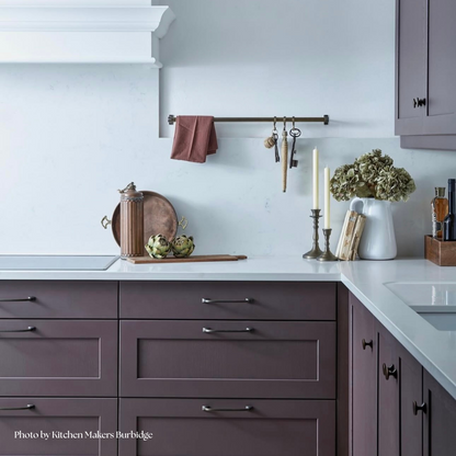 Faux earthy green dried ruffle hydrangea on kitchen worktop shown with plum toned kitchen