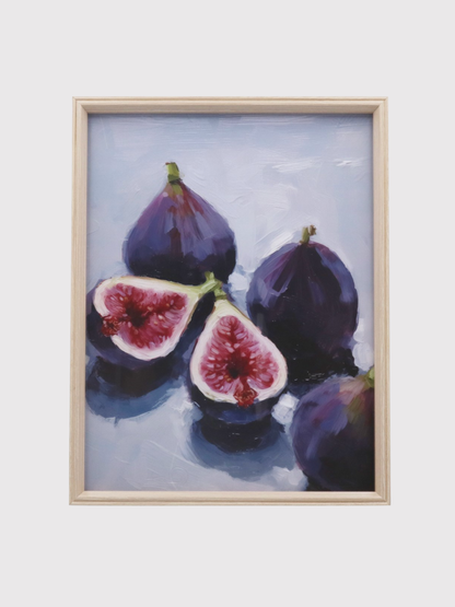 Framed artwork of figs on a light blue background