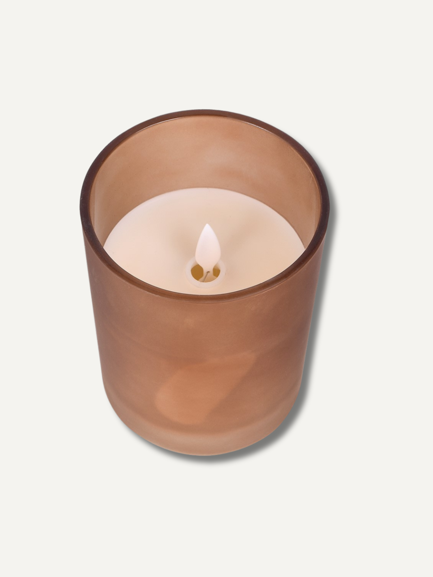 LED Candle in a glass container with a wooden lid on a light gray background