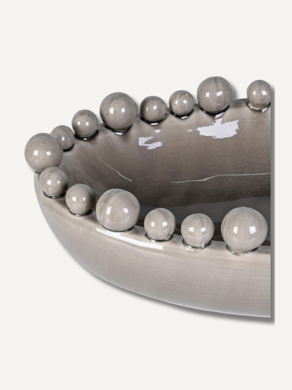 Up close of grey oval bobble decorative bowl