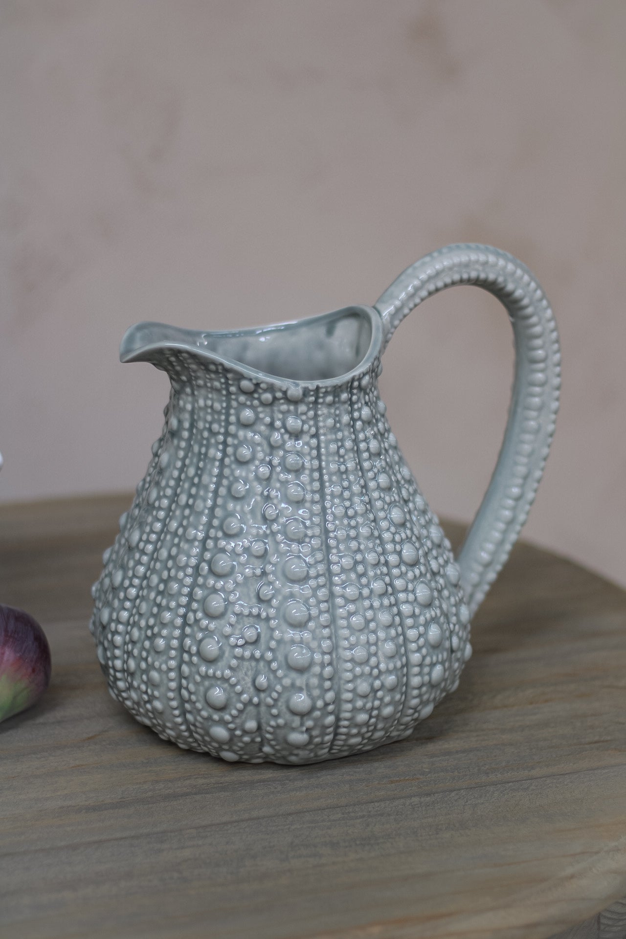 elegant grey jug with sea urchin inspired design, perfect for adding something a little bit different to your home decor.