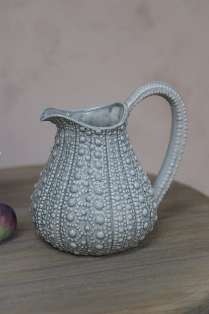elegant grey jug with sea urchin inspired design, perfect for adding something a little bit different to your home decor.