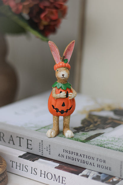 Standing halloween rabbit ornament in pumpkin costume