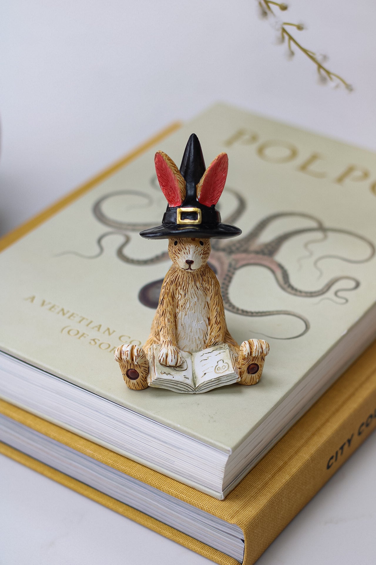adorable autumn rabbit ornament with wizard hat and reading spells book