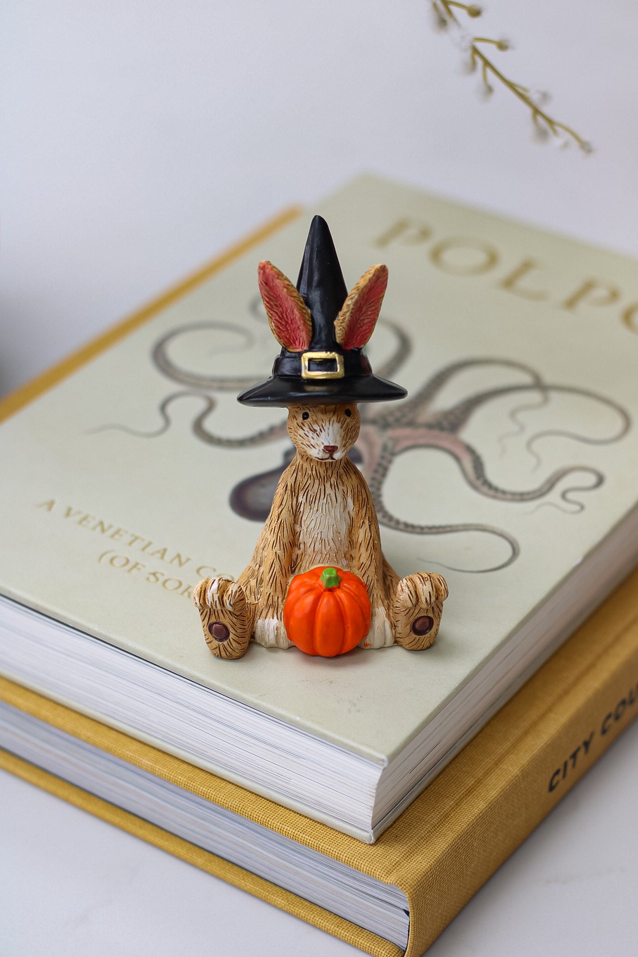 halloween rabbit ornament with wizard at and pumpkin