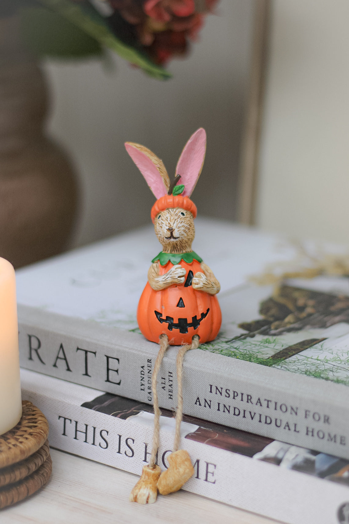 Adorable shelf dangling resin rabbit ornament sitting in pumpkin 