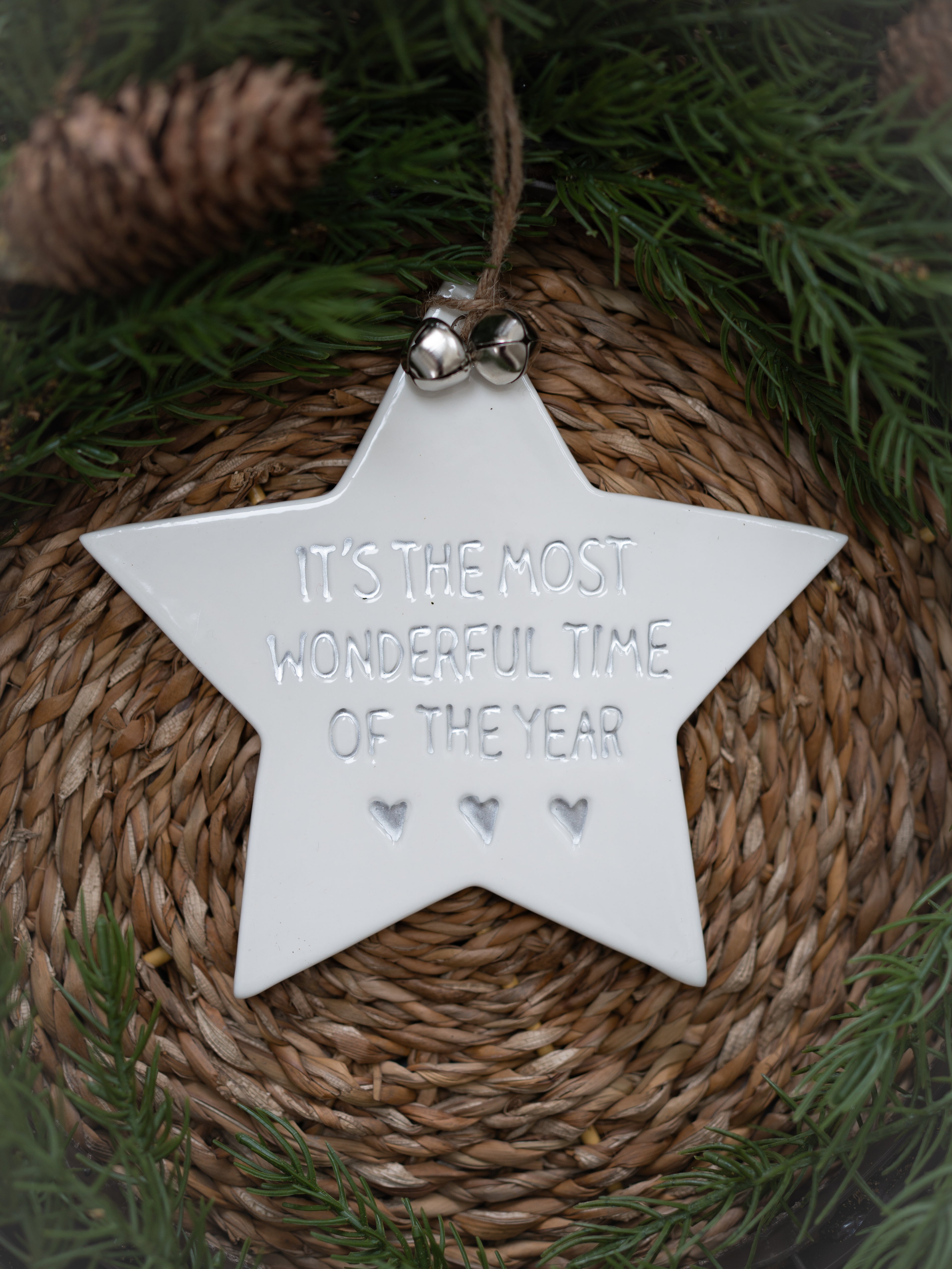 White star-shaped ornament with &