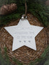 White star-shaped ornament with &